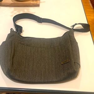 Large Pacsafe crossbody purse. Good security. NWT